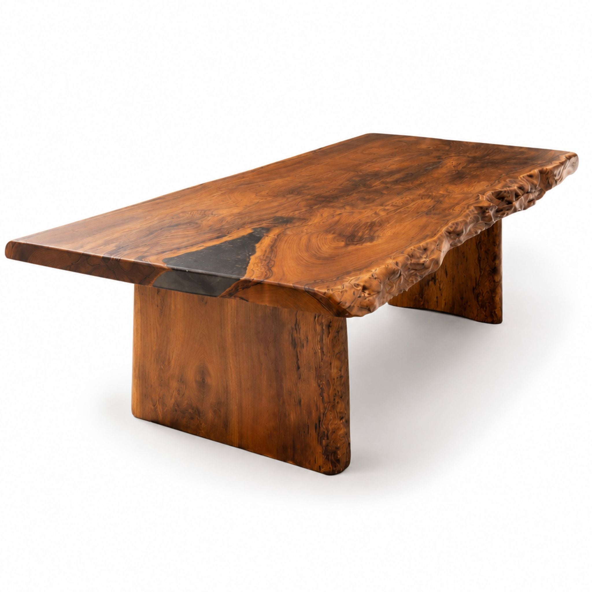 Solid mahogany statement dining table handmade in Barbados with sculpted live edge and slab pedestal base
